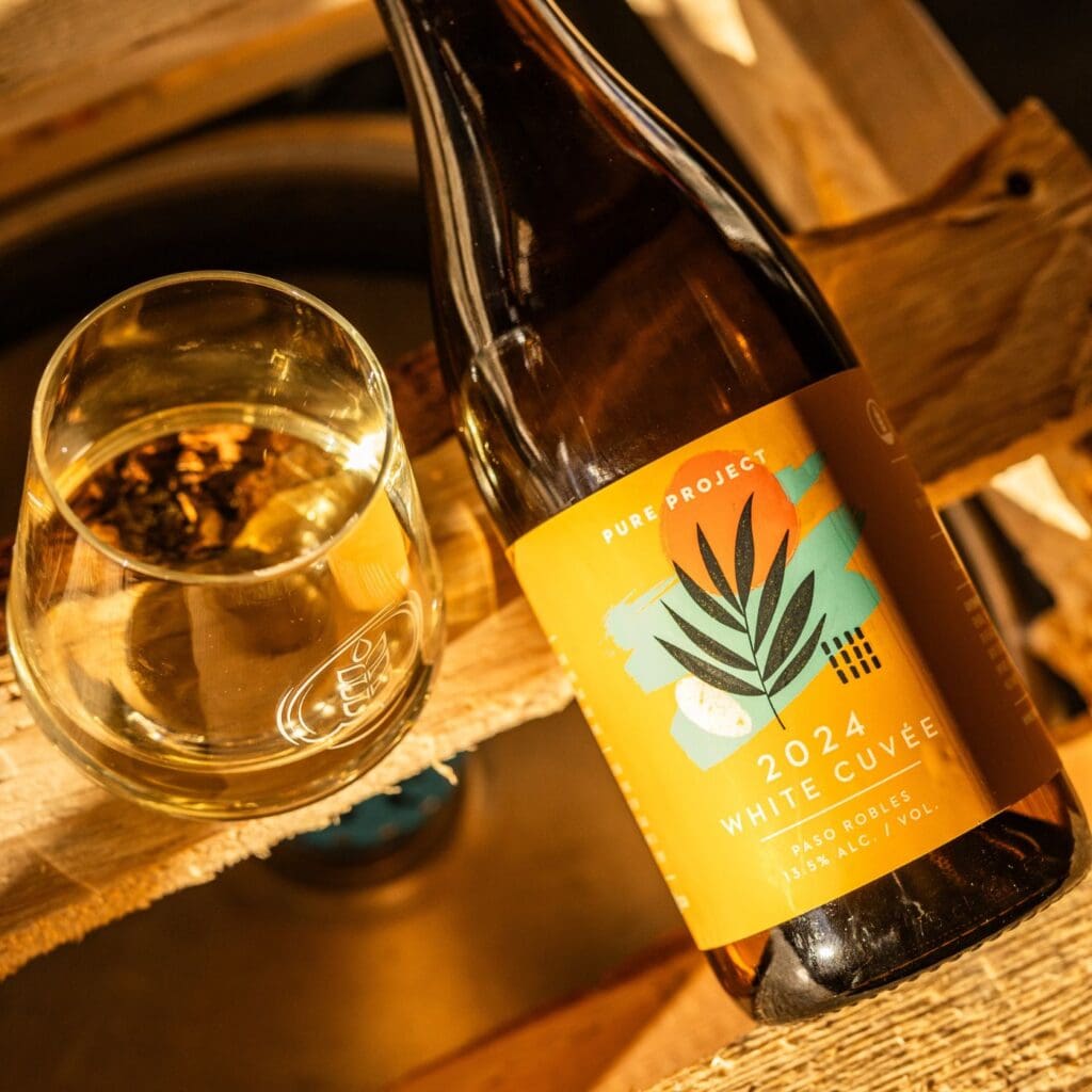 Bottle and Pour of Pure Project's White Wine Cuvée with Tablas Creek