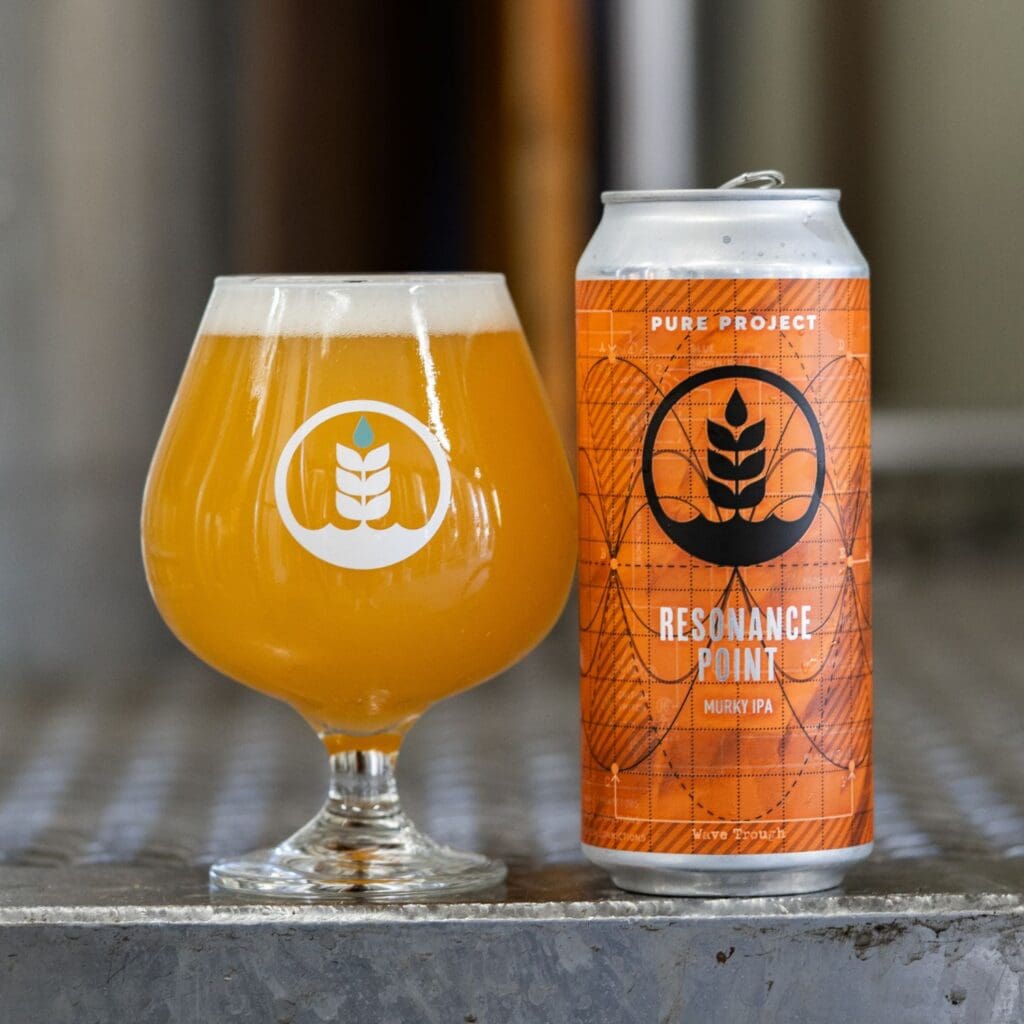 Pour and can of Resonance Point Murky IPA