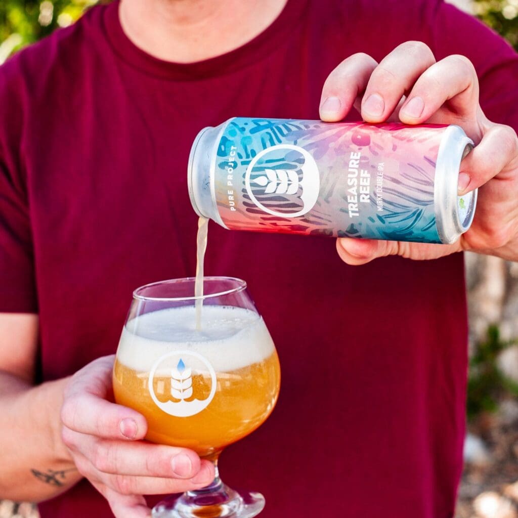 Can and pour of Treasure Reef Murky Double IPA